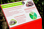 Protect the hedgehogs" sign at the Arche de la nature, educational garden, Le Mans metropole, Sarthe, France