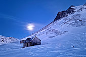 Cape Brewster huts at full moon, Scoresby Strait, ScoresbySund, Greenland