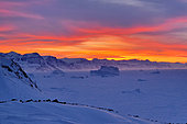 Sunset over the Strait of Scoresby from the heights of Cape Brewster, Scoresbysund, Greenland