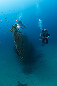 Divers and the wreck of the mine-spotting submarine Le Rubis. On January 31, 1958 she was sunk by Commandant Riffaud 3 km off Cap Camarat. Var. France.