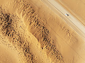 The C14 gravel road at the edge of the Namib Desert. Aerial view. Drone shot. Namibia.