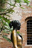 A bronze statue of Juliet by Nereo Constantini stands in the courtyard of Juliet's house, Verona, Veneto, Italy. The statue was donated by the Lion's Club. Juliet's right breast has been rubbed clean over the years by tourists placing their hand there.