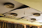 Detail of the ceiling lights with their 1960s design, now damaged by water leaking in. Galeb, Tito's old luxury yacht, Rijeka, Croatia