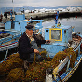 Fisher man at Skala Kallonis, Lesvos, Greece
