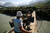 Across the River Vjosa carrying a load of grapes, Valley of Permet, Albania