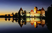 Trakai, Lithuania: the insular castle reflexing on Galves lake with 'midnight sun';