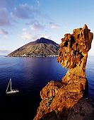 Italy, Sicily, Stromboli island. Stack rock of Strombolicchio  in foreground