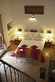 Bedroom interior, Riad Larrousa, traditional Moroccan riad, Fes, Morocco. Property released.