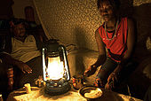 Betty,a Masai guide, at home with Mwura,also a Masai guide, after a day's work in the National Reserve