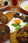 Vegetarian English breakfast at Paskins Hotel including homemade vegetarian sausage made with sun-dried tomatoes, paprika and tarragon.
